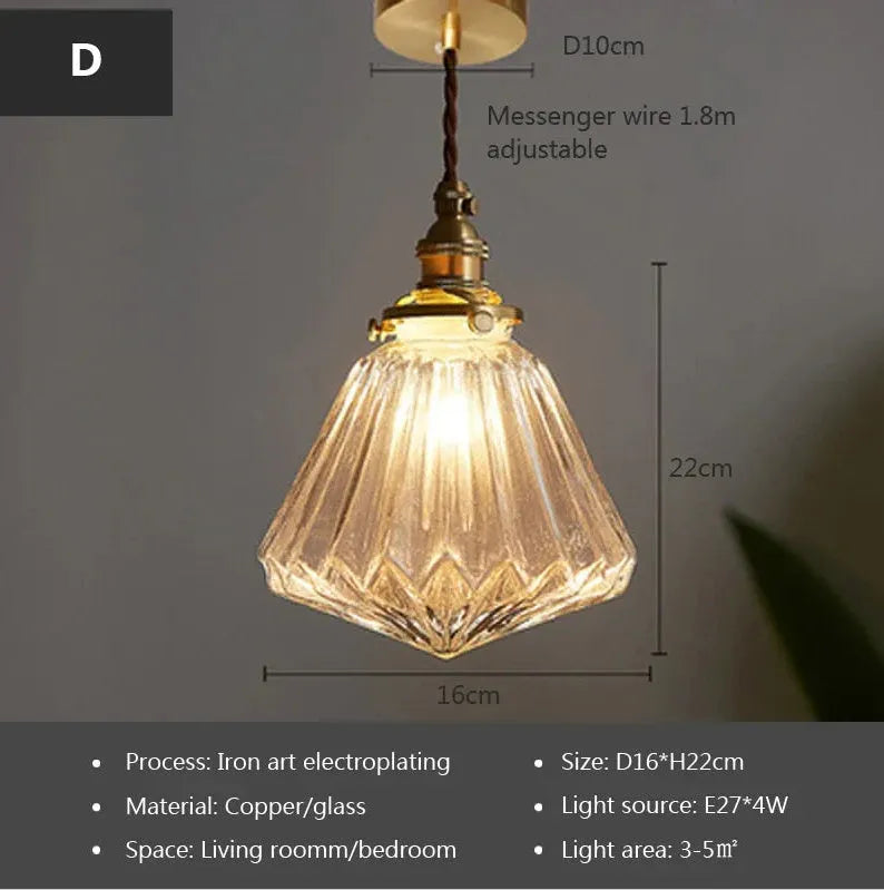 Retro brass and glass ball chandelier ceiling light with copper frame and spherical shade.
