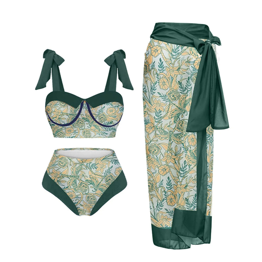 Women's pink printing split swimsuit three-piece set with separate skirt, bra and panties on mannequin