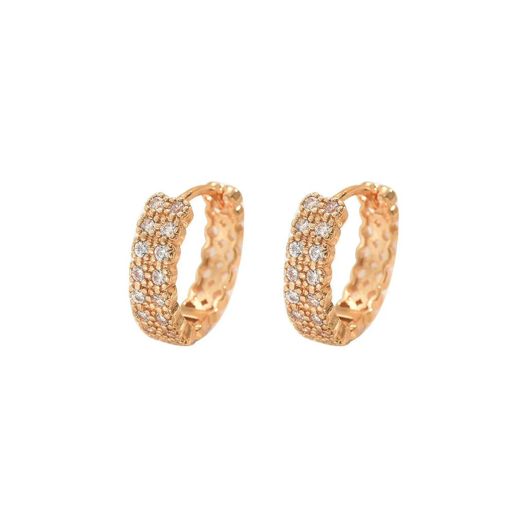 Geometric pattern copper ear studs in colour DE20288 with round, dot, and ring details.