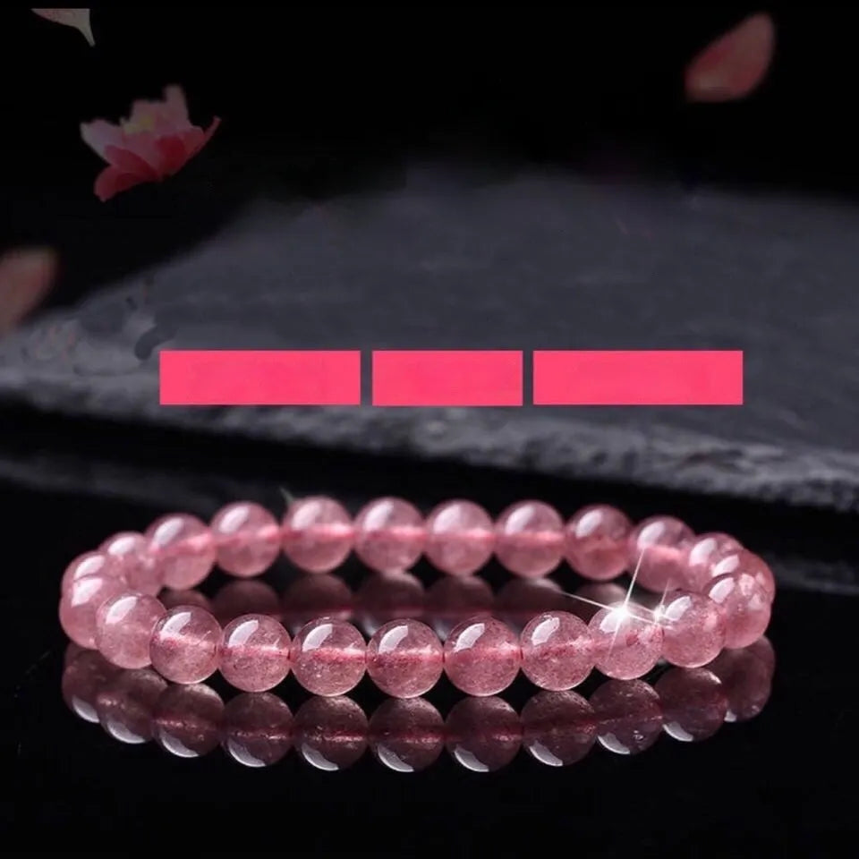 Women's strawberry quartz bracelet with 6mm, 8mm, and 10mm polished crystal beads