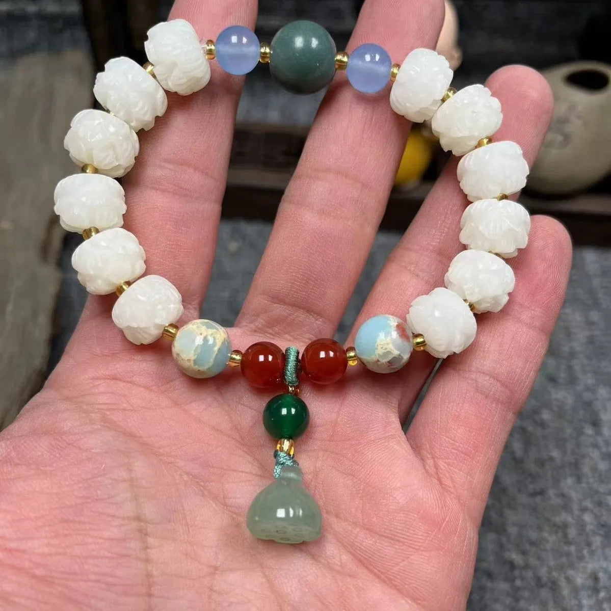 Carved pumpkin lotus Bodhi root bracelet with white jade beads and multiple dimensions