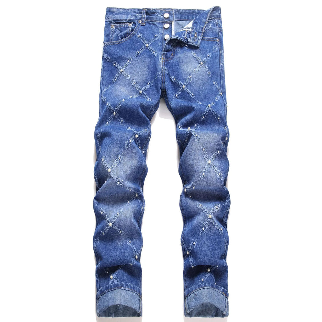 Pearl embroidery street trendy denim skinny pants in blue with mid-rise tapered leg and embroidered pearl details.