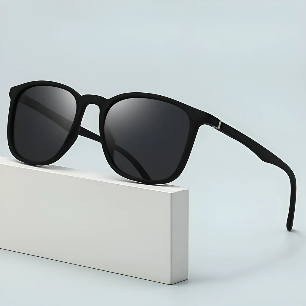 Men's polarised sunglasses with a polycarbonate frame and elastic spectacle foot, shown in various colour combinations.