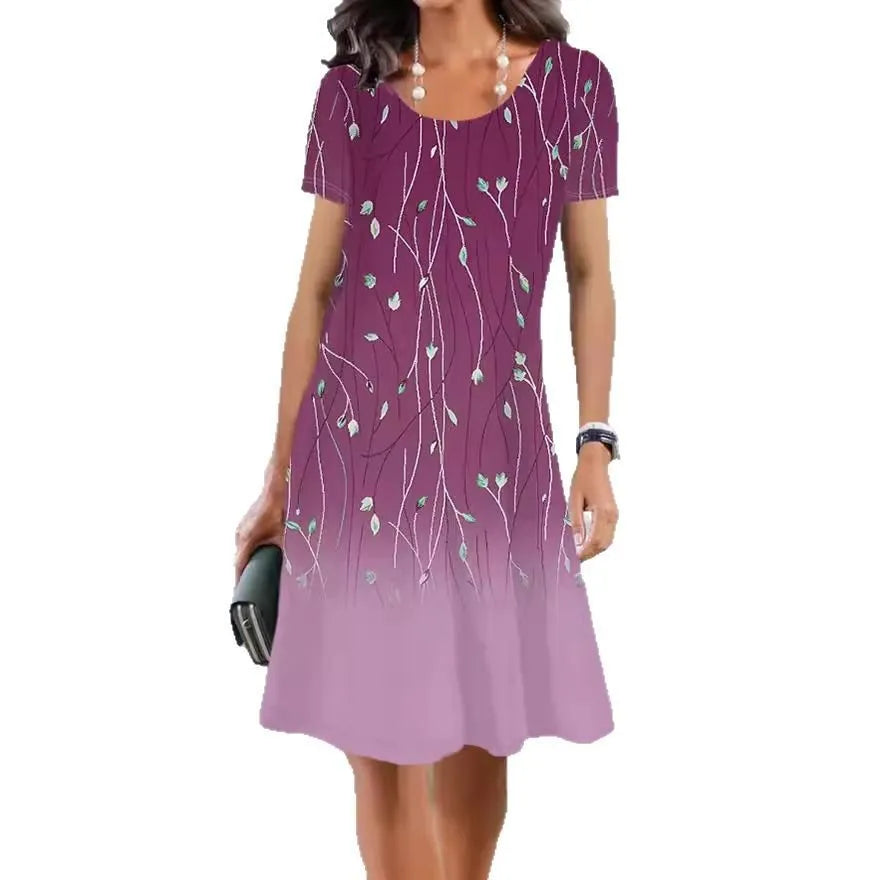 A mid-length floral print dress with short sleeves and a round neckline on a mannequin.
