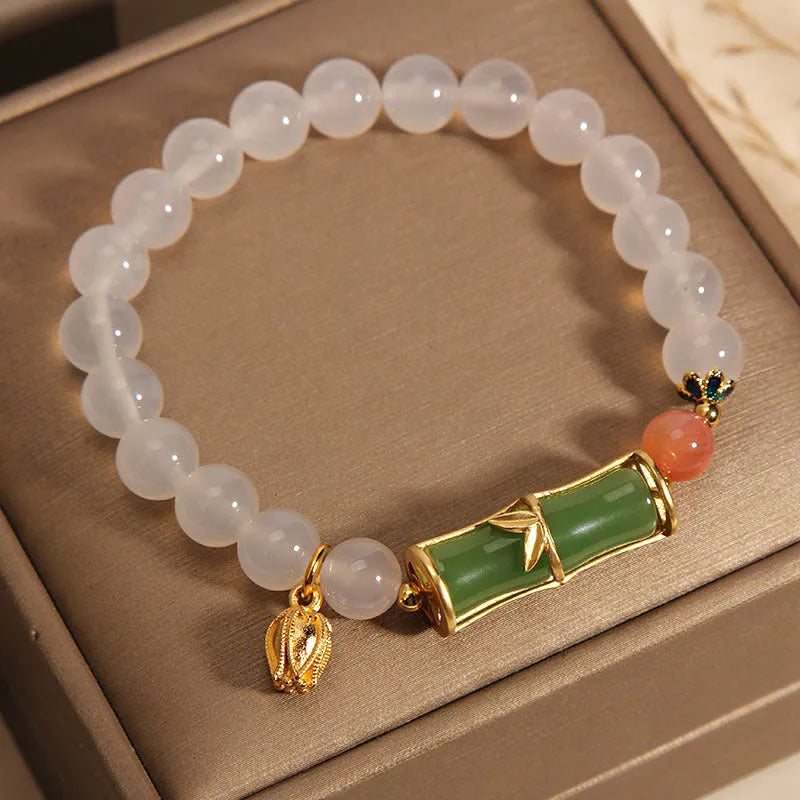 White agate jasper bracelet with a natural jade bead and bamboo joint design
