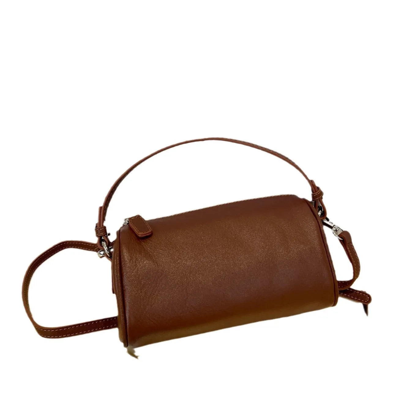 Genuine leather crossbody phone bag in cylindrical shape with single shoulder strap
