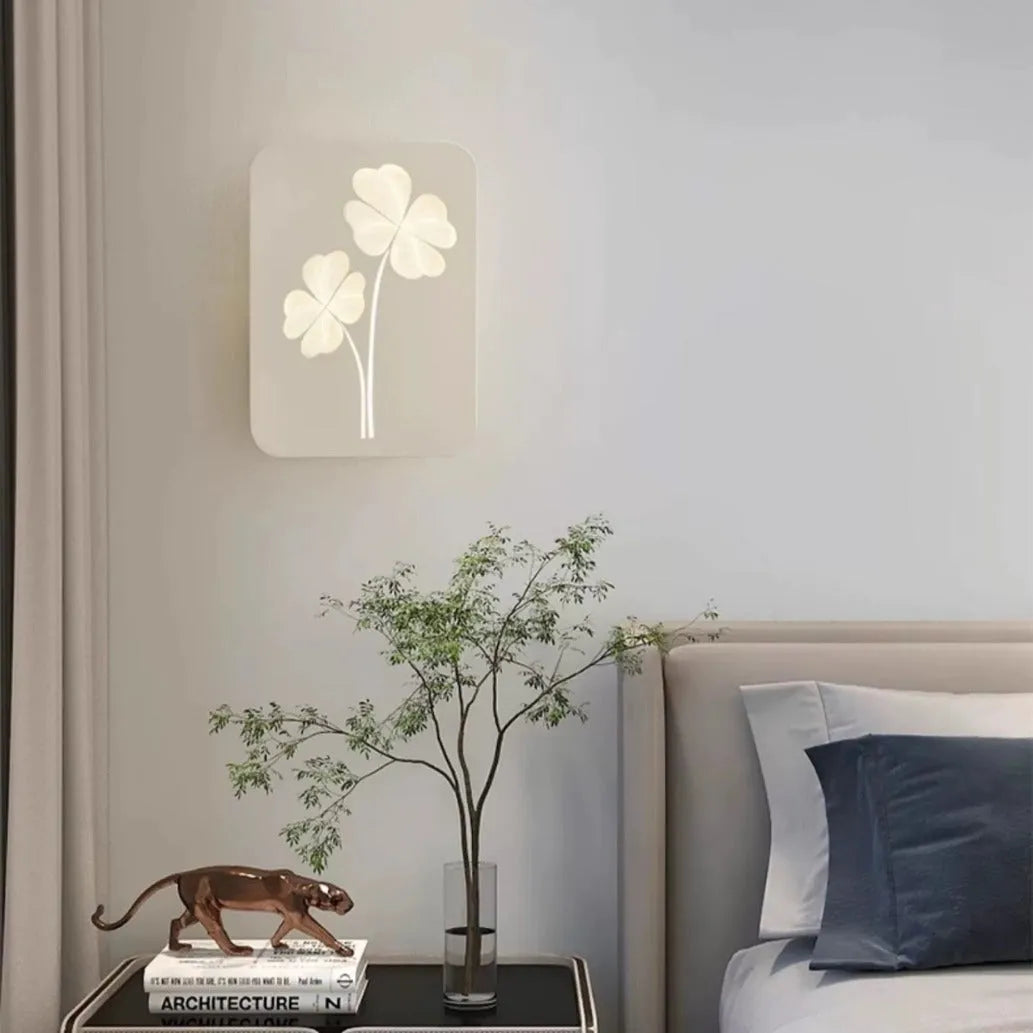 Modern bedside lamp with acrylic shade and iron construction showing tricolour LED illumination
