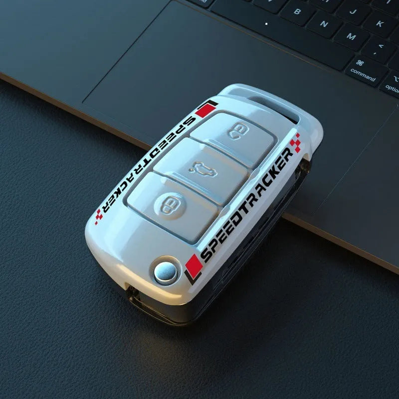 Carbon fibre style car key cover with mirror accent in carbon and white colour options