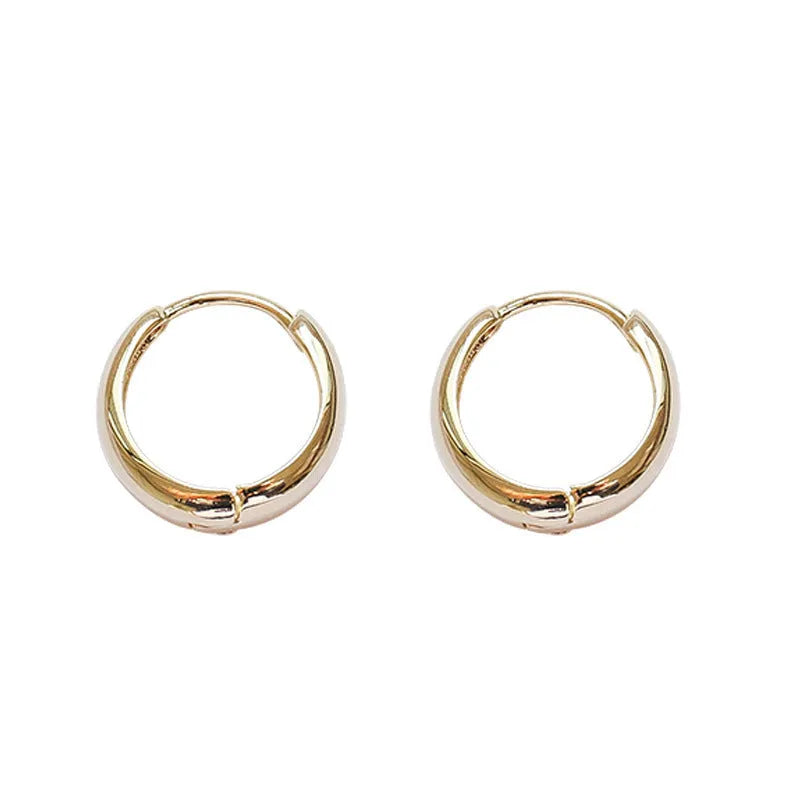 Women's geometric water drop earrings in gold or silver with retro minimalist design