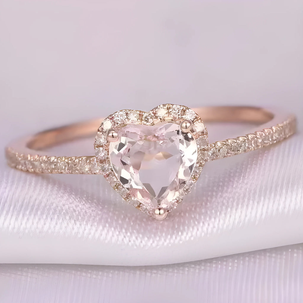 Heart-shaped women's fashion ring with crystal details in rose gold or silvery electroplated finish.
