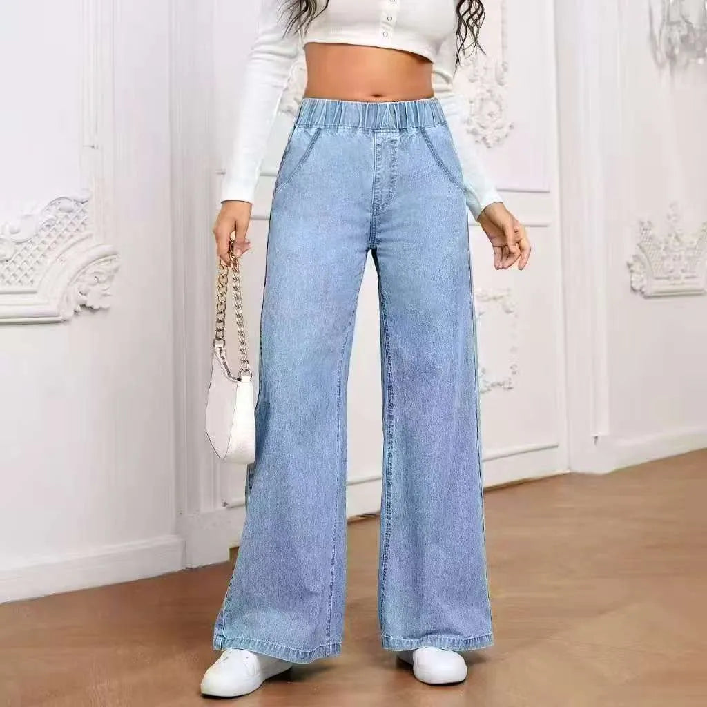 Plus size light blue washed straight leg jeans with wide fit and mid waist design