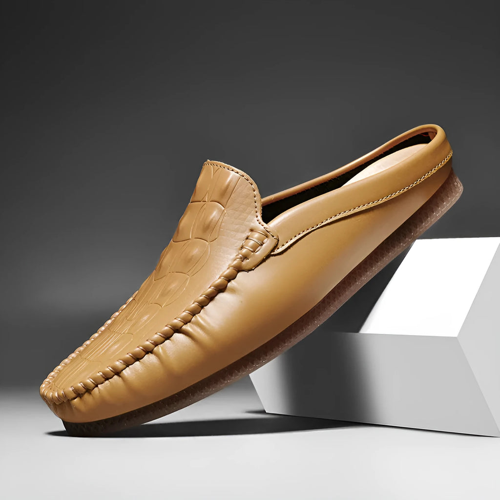 Men's black breathable semi-slippers with a rubber sole and artificial PU upper on a plain background.