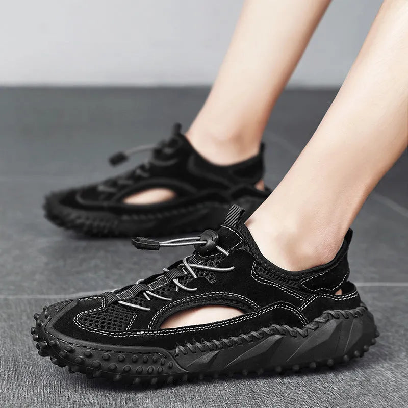 Men's black sports sandals with leather mesh upper, elastic band and non-slip rubber sole.