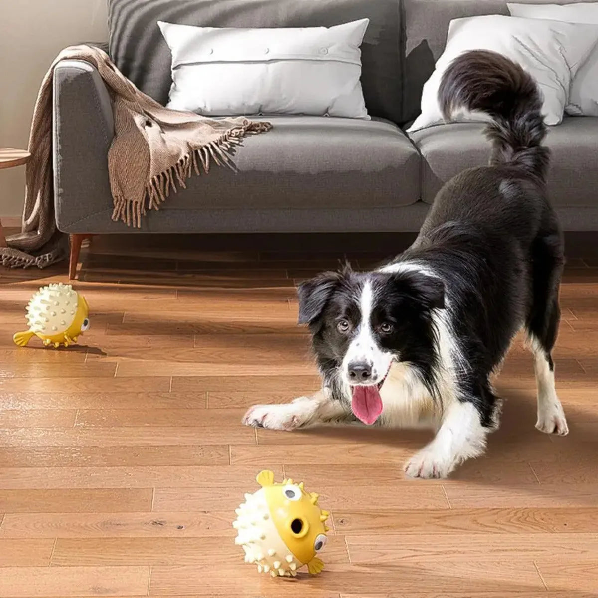Yellow fish-shaped dog chew toy with textured surface for aggressive chewers