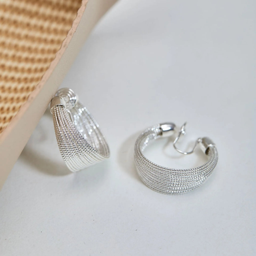 Geometric multi-layer bracelet earrings in silver and gold electroplated copper with stud and clip-on options