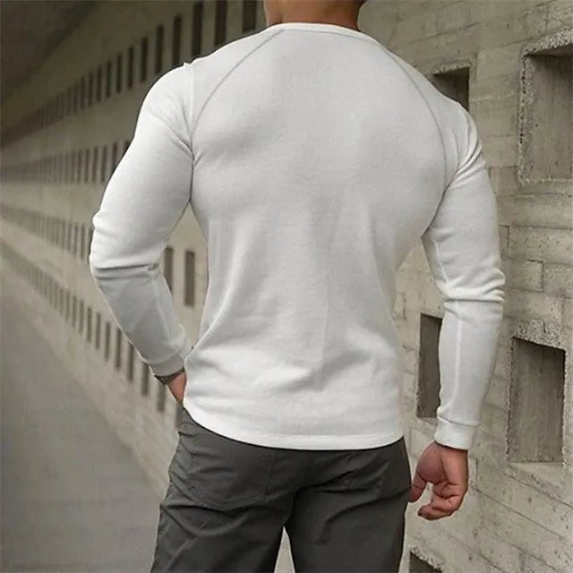 Men's white long-sleeved T-shirt with Henry collar detail on hanger