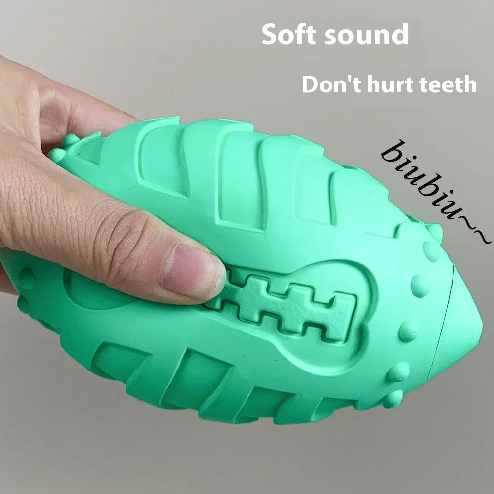 Light green thickened rubber rugby ball dog toy with textured biting surfaces
