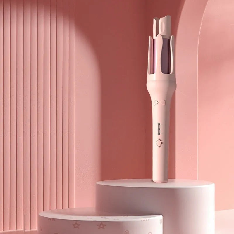 White automatic hair curler with 32mm barrel showing pink or purple colour accents and included power adapter