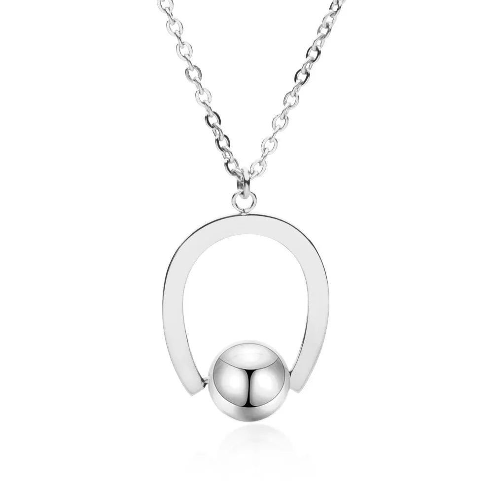 Adjustable stainless steel necklace with geometric pendant on cross chain