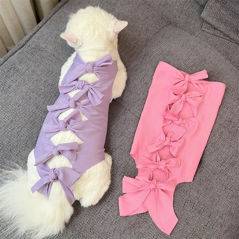 Lace-up polyester cat sterilisation clothing in multiple colours on size chart for 1.5kg to 9kg pets.