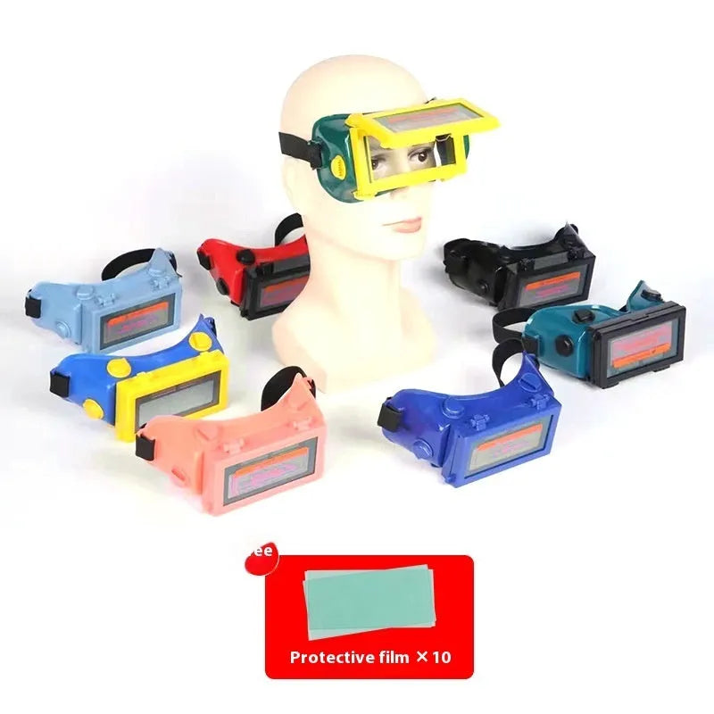 Green light-changing electric welding glasses with flip dimmer and PVC frame