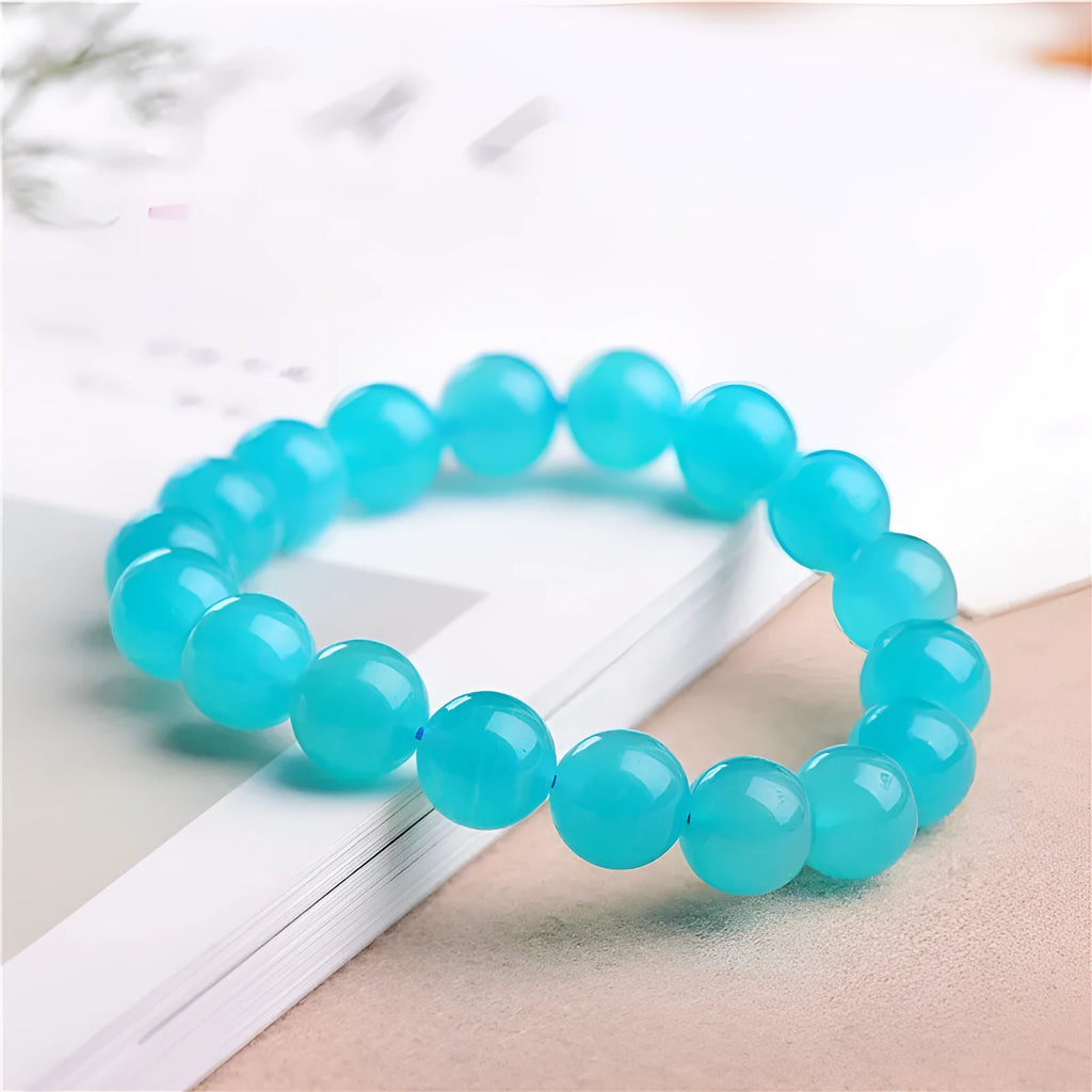 Natural Amazonite scattered beads bracelet with polished finish in ice blue-green colour