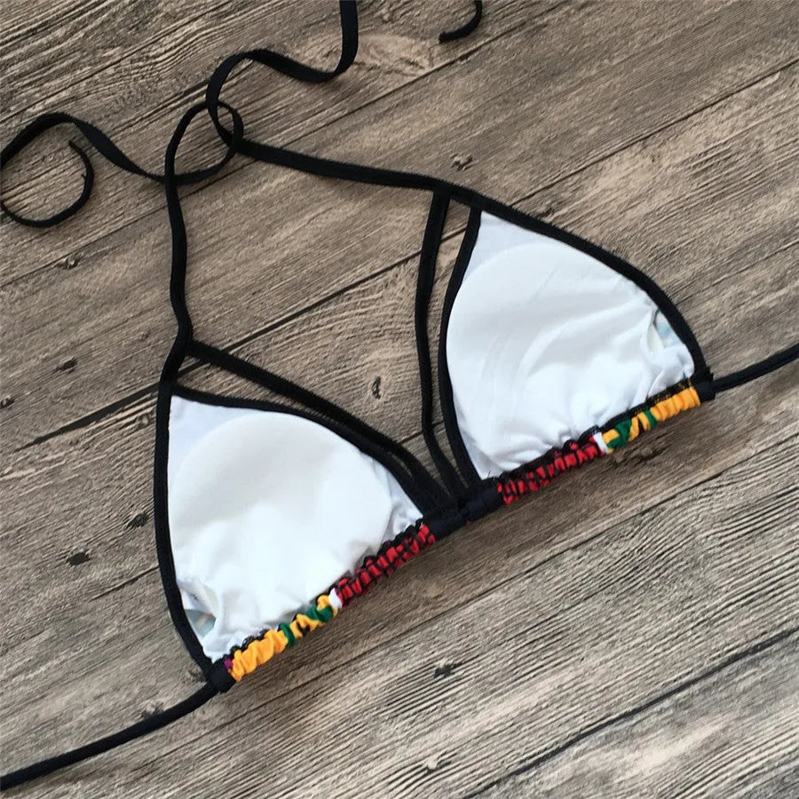 Women's high-waisted bikini set with digital print pattern, showing top and briefs.