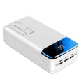 Black or white 50000mAh power bank with three USB output ports showing size scale