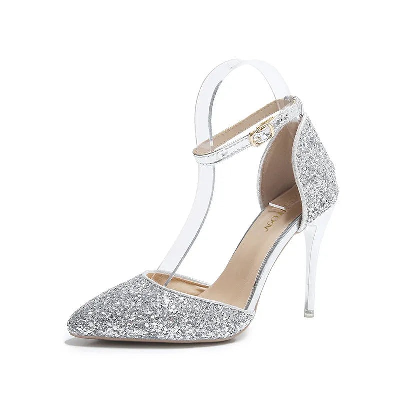 Gold and silver stiletto heel pumps with beaded and belt decoration on a solid-colour upper