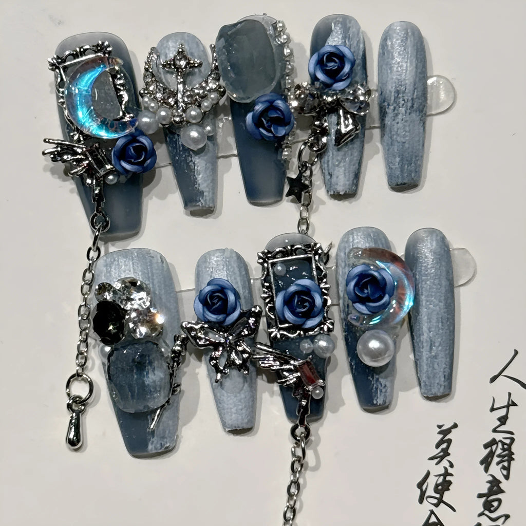 Heavy industry night blue nail stickers with ornate rose and tulip flower pattern for evening manicures.