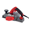 Red electric wood planer with aluminum body for carpentry and workshop use