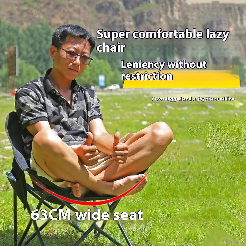 Beige folding camping chair with steel frame and Oxford cloth seat in outdoor setting