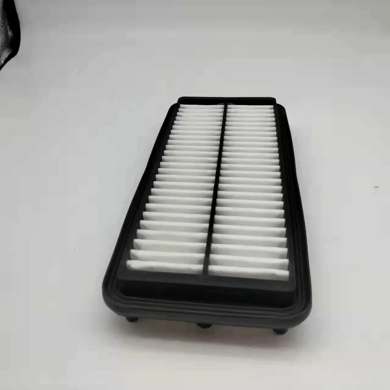 Black car air filter with 256x113x40mm dimensions for modern vehicles