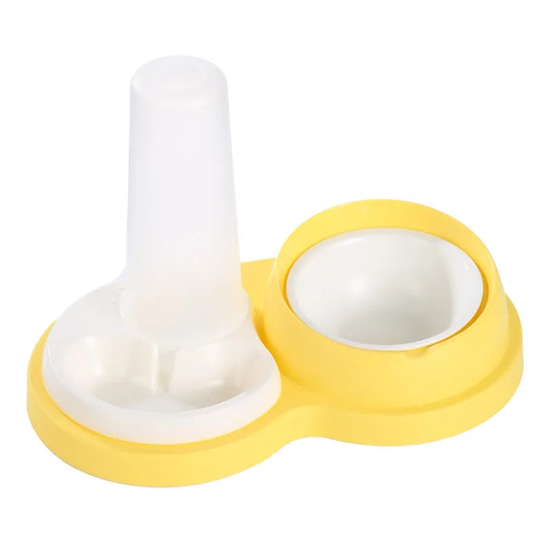 Grey and yellow dual ceramic pet feeding bowl with stainless steel insert and non-slip base.