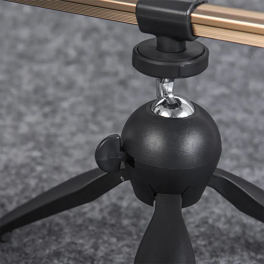 Aluminium ice fishing rod holder bracket with tripod legs on ice