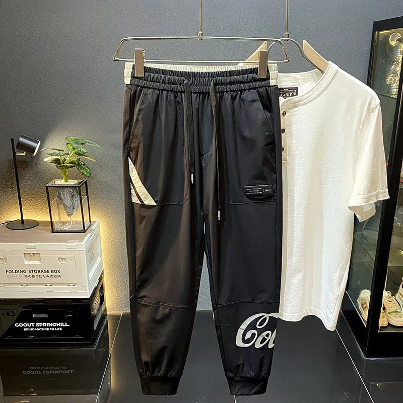 Black men's casual cropped trousers with an ankle band, made from ultra-thin ice silk cotton fabric.
