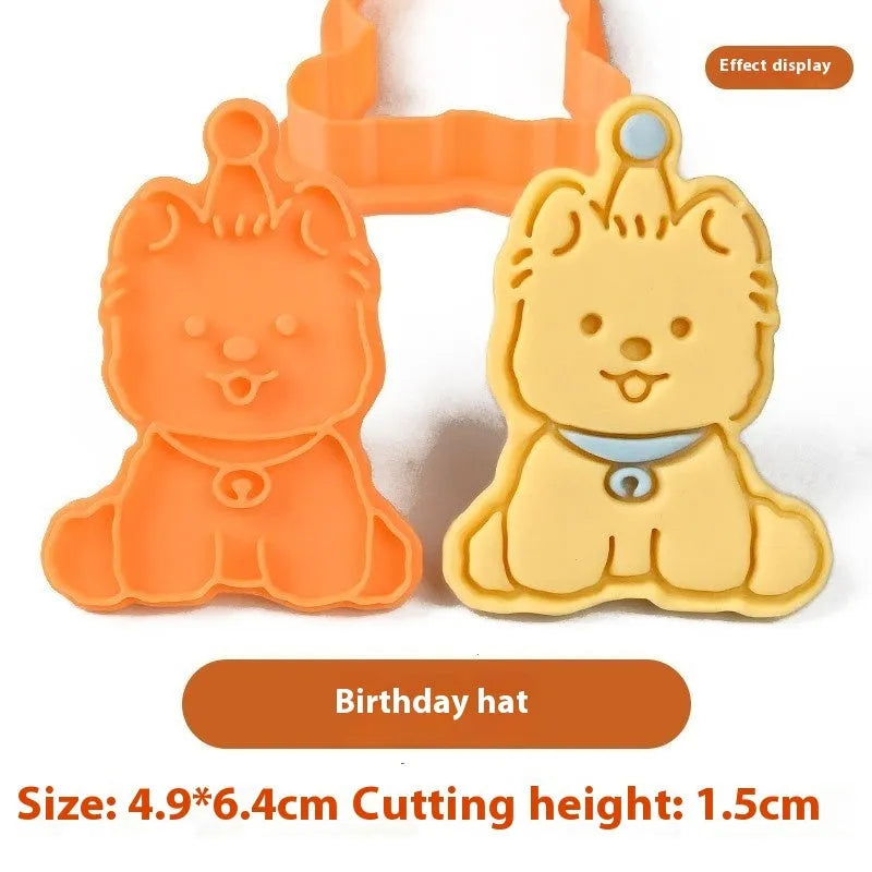 Plastic 3D cartoon puppy biscuit mould showing seven style variations including birthday hat and swimming ring designs