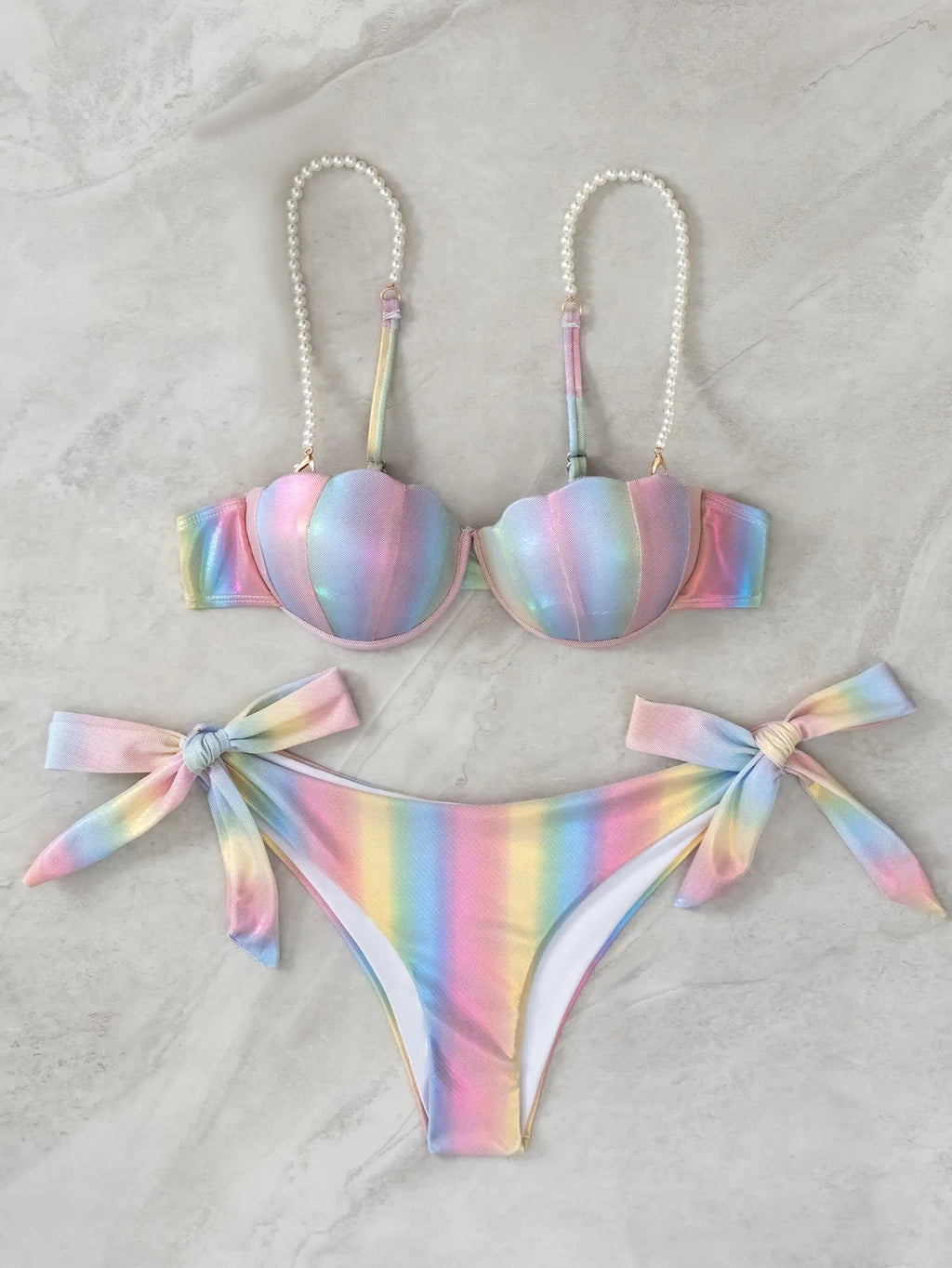 Women's rainbow split tied bikini swimsuit made from polyester fabric.