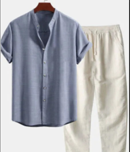 Men's green and blue flower print polyester slim fit casual shirt suit set on a hanger.
