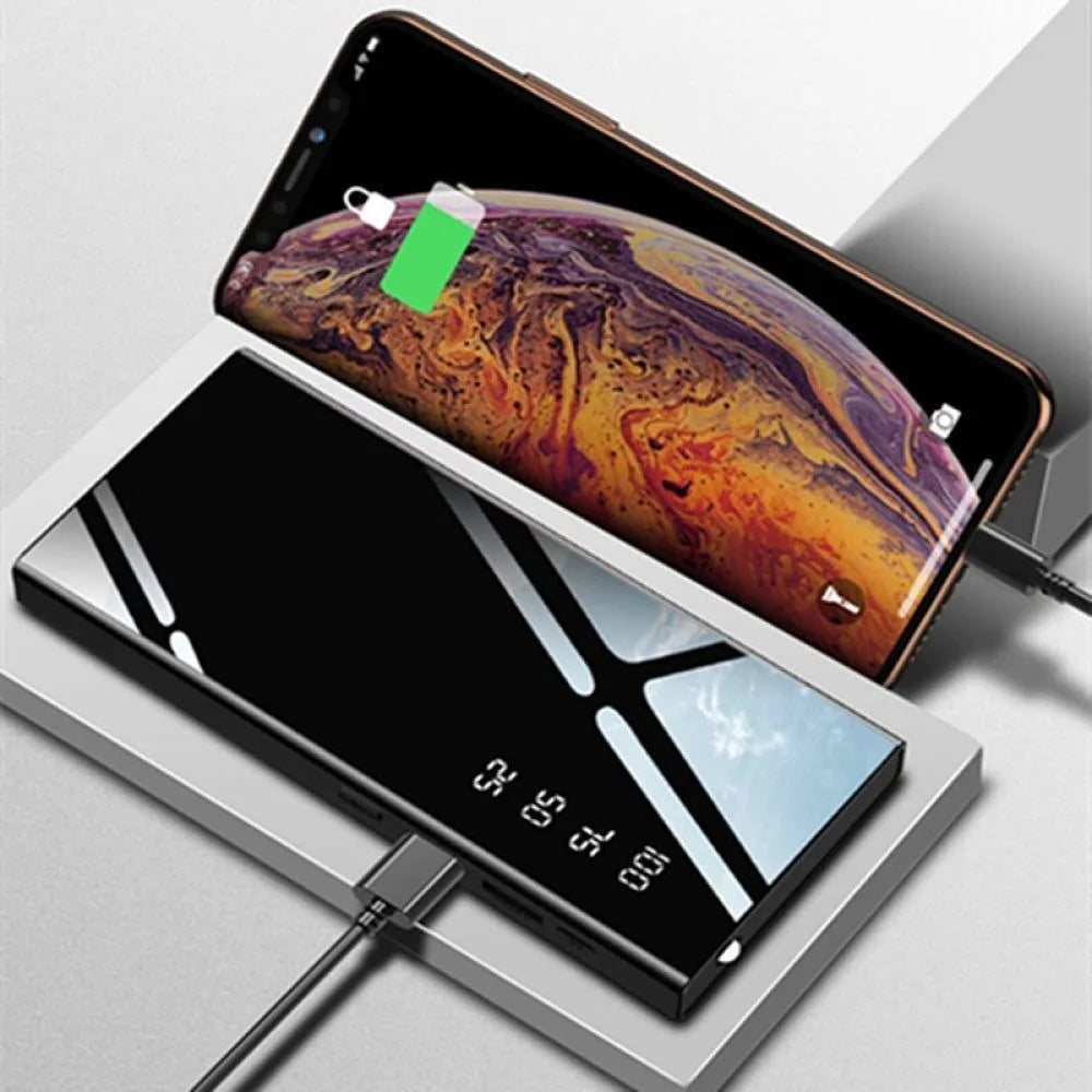 20000mAh portable power bank with LCD screen, dual USB ports, and LED torch in black, red, or white.