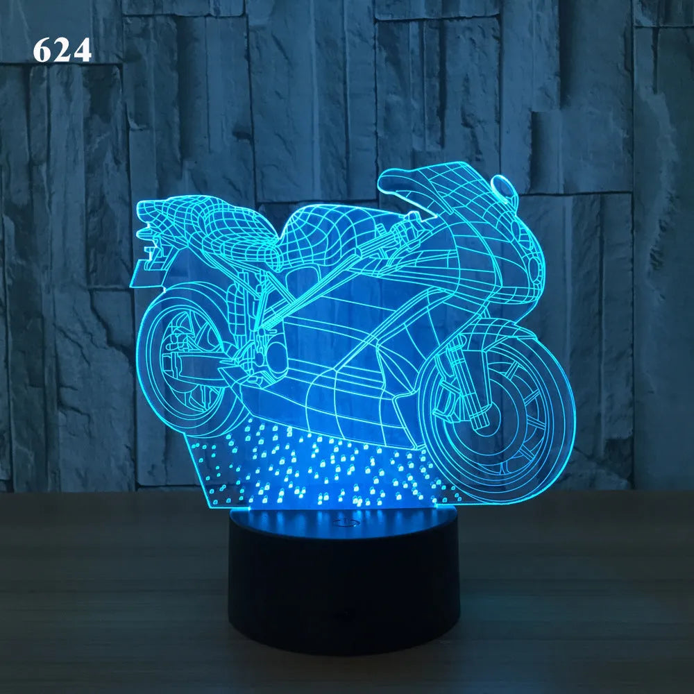 Motorcycle LED desk lamp with black base and acrylic shade on a wooden desk, 220x130x90mm