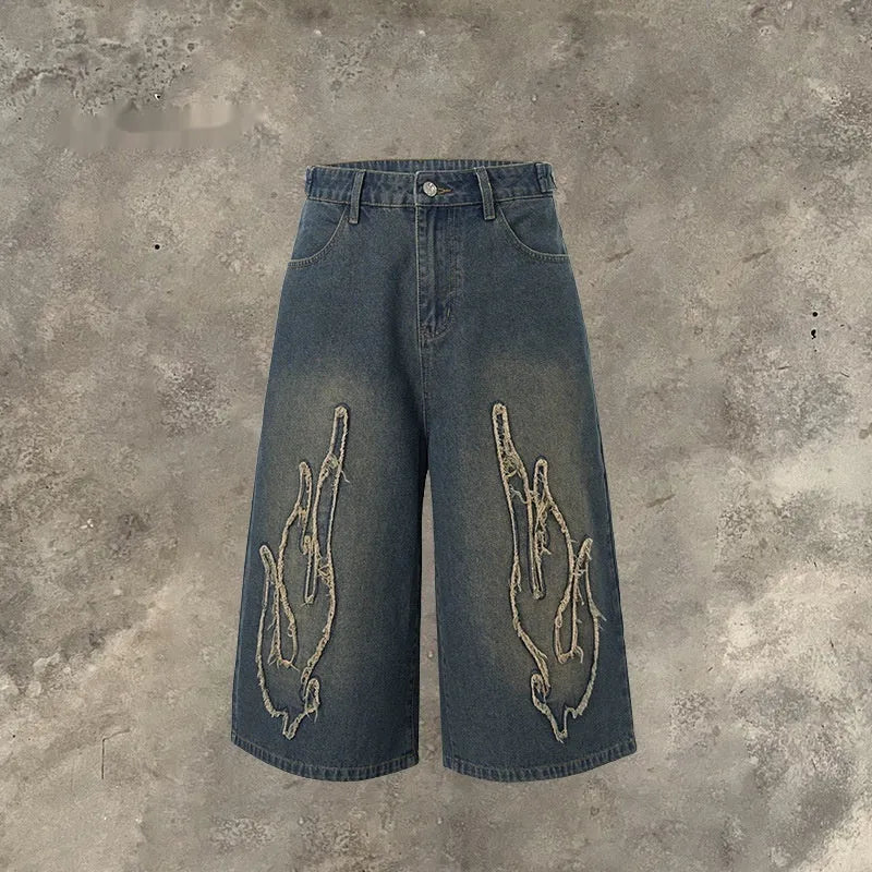 Men's black denim shorts with patch and flame embroidery, cropped length straight leg streetwear