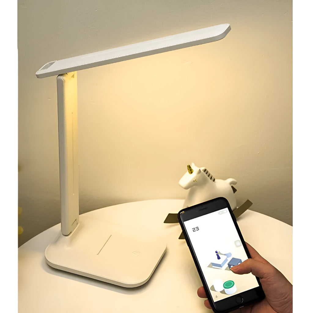 White bedside lamp with touch dimming control and USB charging port for children's bedrooms