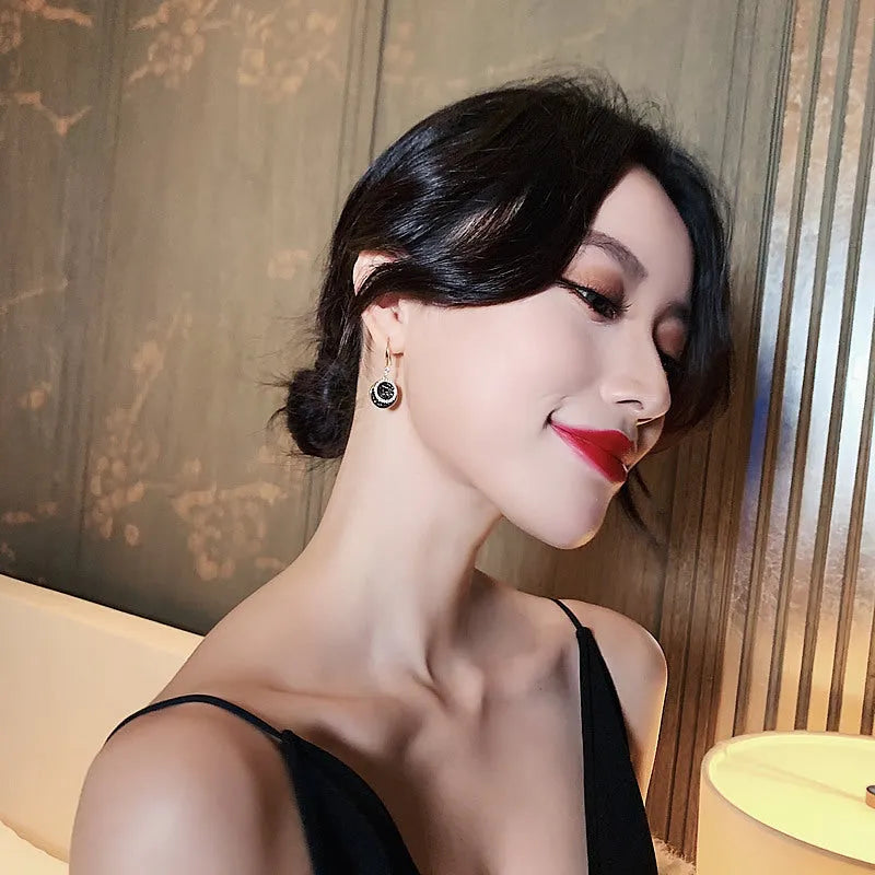 Black geometric round alloy earrings with 3.6cm drop length, retro Hong Kong style design