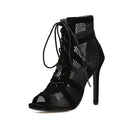 Black suede women's lace-up high heel shoes with 11.5cm heel on a plain background