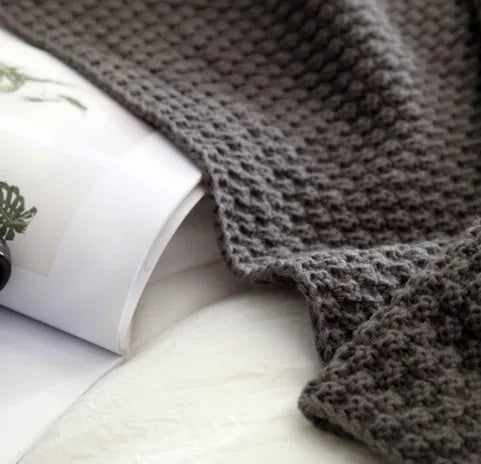 Nordic style fringed acrylic knit blanket in plain weave showing beige colour option