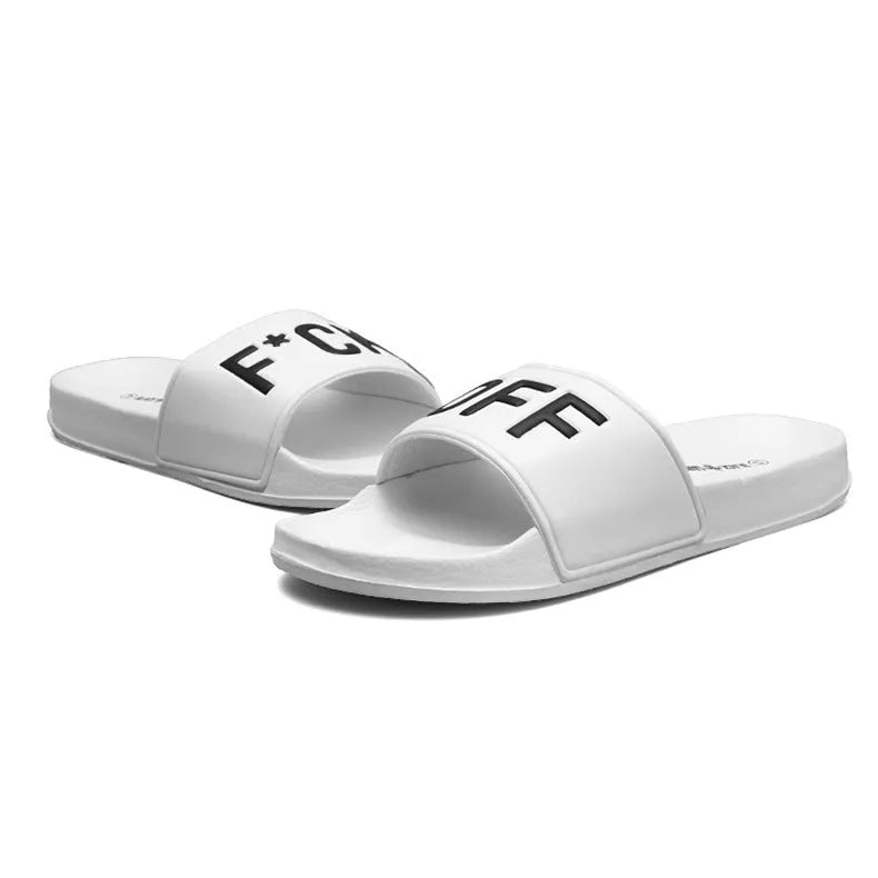 Men's black open-toe rubber slippers showing viscose sole construction