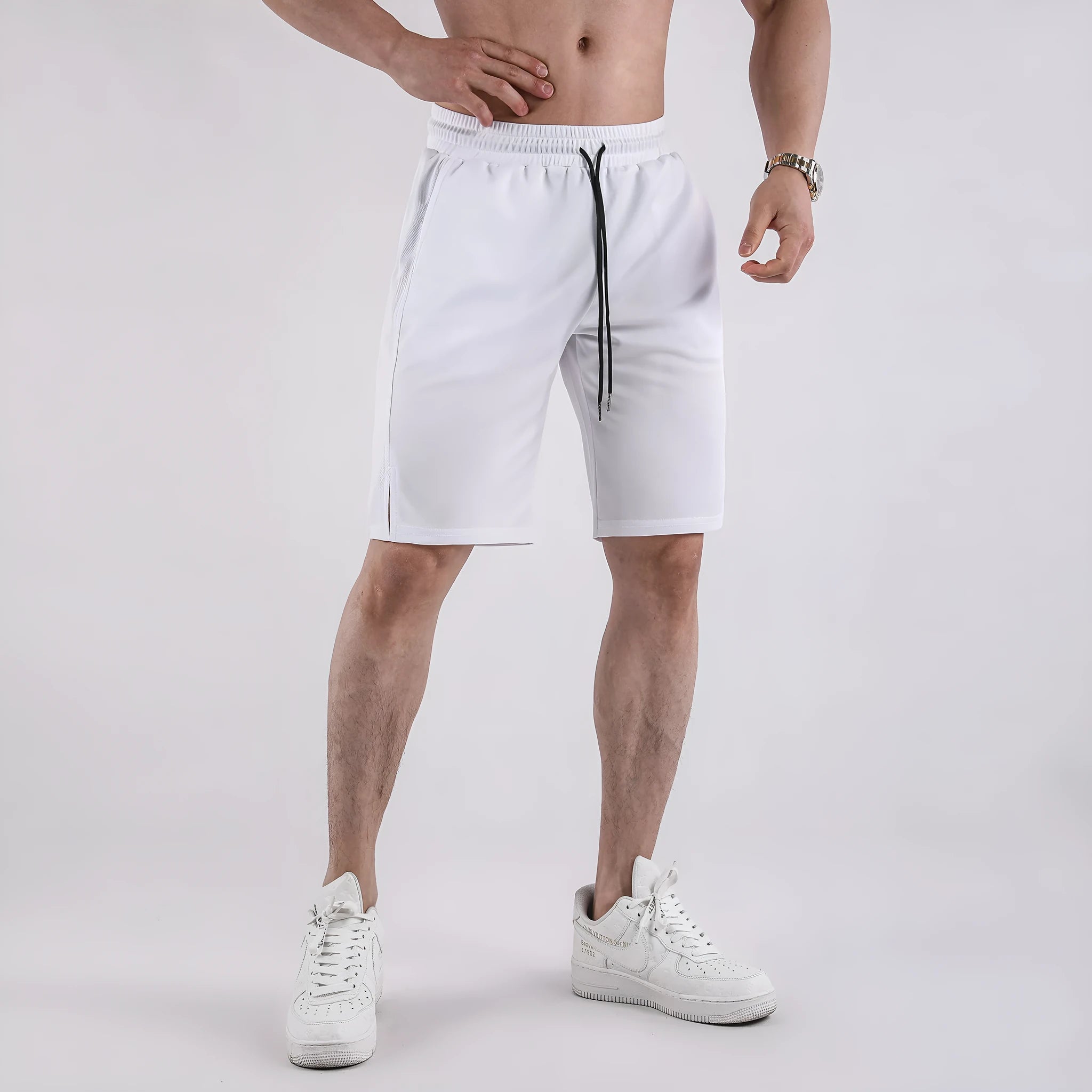 Men's quick-drying mesh sports shorts with elastic waistband in black and white colours