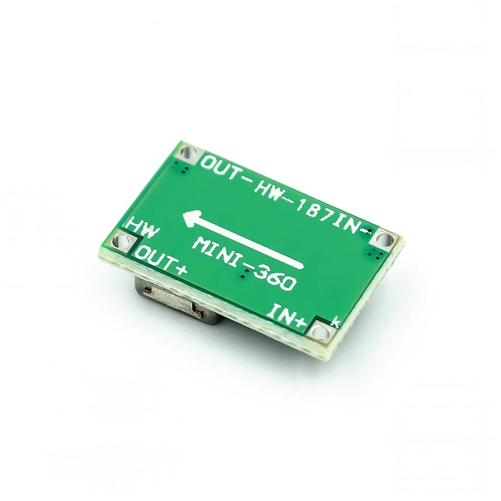 Green Mini-360 DC-DC buck converter module measuring 17x11mm with adjustable output voltage