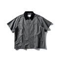 Short sleeve washed cotton overalls shirt in loose cardigan style, khaki colour, on hanger